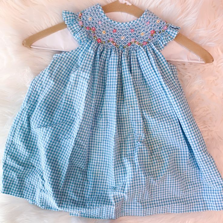 Boutique Blue And White Gingham Dress, Perfect For Summer! Comes With Matching Bloomers. New With Out Tags, Never Worn. Cute Smocked Dresses For Playdates, Blue Cotton Playwear Dress, Cute Smock Dress For Playdate, Blue Cotton Dress For Playwear, Playful Blue Dress For Playdate, Playful Blue Dresses For Playdate, Playful Light Blue Dress For Playtime, Cute Blue Cotton Dress, Playful Smock Dress For Playdate