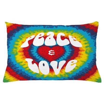 a pillow with the words peace and love in white letters on a multicolored tie dye background