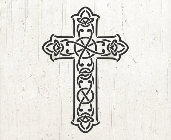 a cross with an intricate design on it