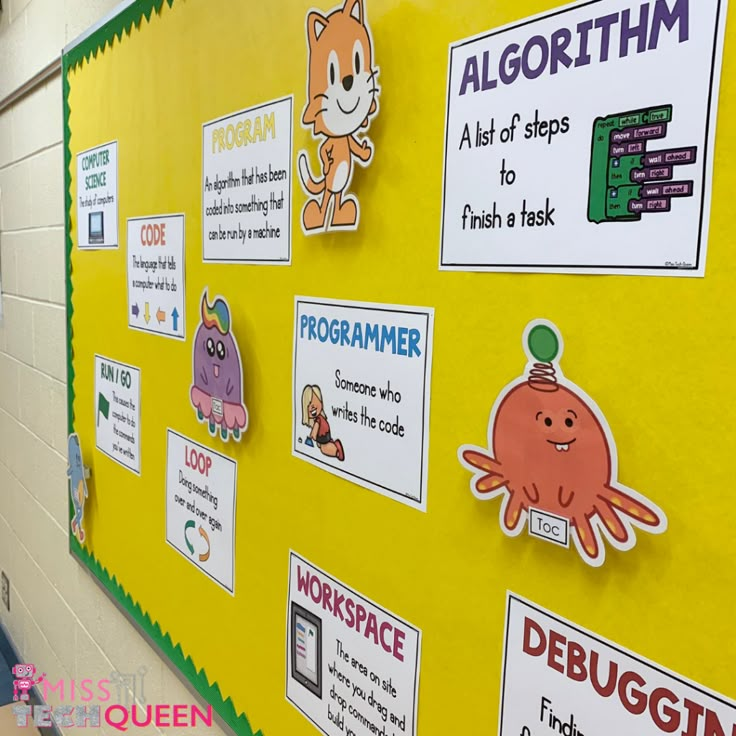 a bulletin board with stickers on it in a school hallway, showing information about different types of animals