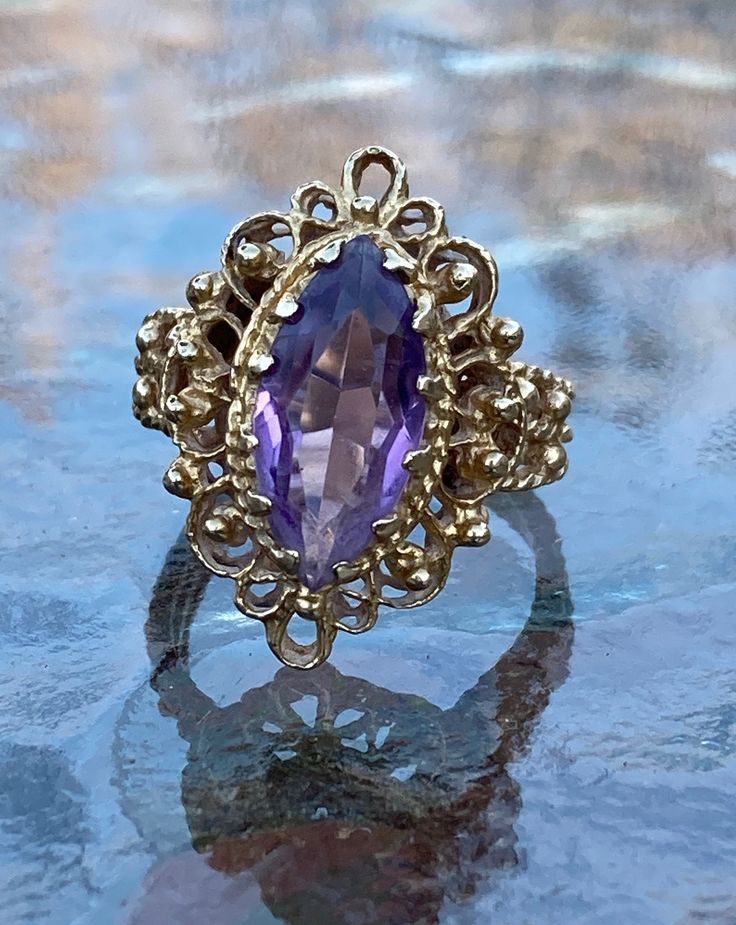 ~ Vintage, 14K Gold, Victorian Amethyst Ring. Ring Size 7, Weighs Approximately 6.57 Grams On My Scale. This Exquisite Victorian Ring Is Even More Stunning In Person. With A Large 12mm Amethyst Stone In The Middle. In Excellent Condition. ~ Due To The Unique Nature Of Antiques & Vintage Items, They Are Being Sold As Is. Please Keep In Mind, That Most Of All Antiques & Vintage Items Will Show Wear & Imperfections Consistent With Their Age And Use. Please Look At The Pictures Provided Purple Sapphire Ring With 14k Gold Prong Setting, Purple Amethyst Ring With Prong Setting In 14k Gold, Purple 14k Gold Fine Jewelry Rings, Formal Purple Amethyst Ring In 14k Gold, Formal 14k Gold Purple Amethyst Ring, Heirloom Yellow Gold Amethyst Ring With Accent Stones, Heirloom 14k Gold Amethyst Ring With Accent Stones, 14k Gold Purple Sapphire Ring With Accent Stones, 14k Gold Ring With Purple Center Stone