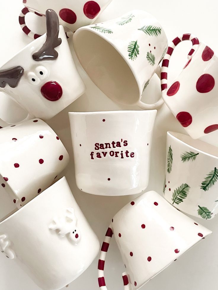 there are many cups and mugs that say santa's favorite