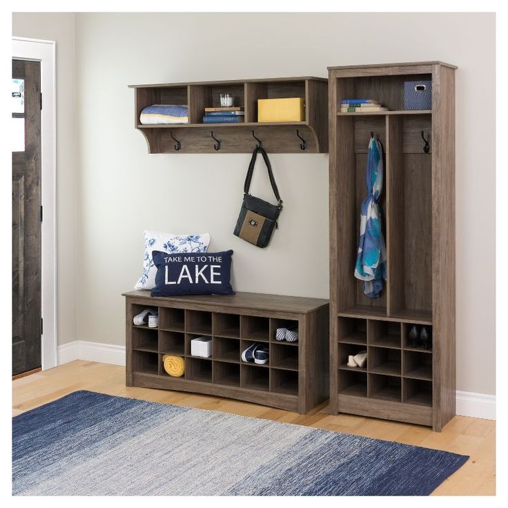 the entryway is clean and ready to be used as a storage area for shoes