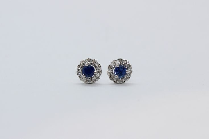 Elevate your style with our meticulously crafted 14K White Gold 3mm ADC Sapphire and .11ct Diamond Earrings, featuring secure screw backs. These exquisite earrings are a testament to the artistry of our skilled artisanal goldsmith at Jewelry By You. Formal Round Sapphire Diamond Earrings, Classic Round Cut Cluster Earrings For Anniversary, Sapphire Earrings With Diamond Accents, Classic Round Platinum Cluster Earrings, Halo Setting Round Cut Earrings For Anniversary, Sapphire Round Cut Earrings For Wedding, Brilliant Cut Sapphire Diamond Earrings, Sapphire Diamond Earrings With Brilliant Cut, Classic Sapphire Diamond Earrings With Accents