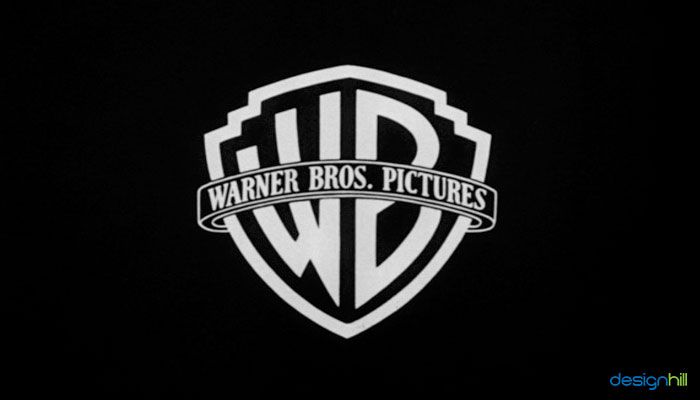 the logo for warner bros pictures is shown in black and white on a dark background