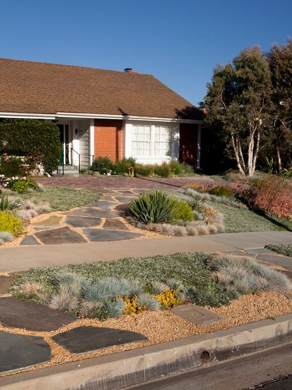 a house with landscaping in front of it