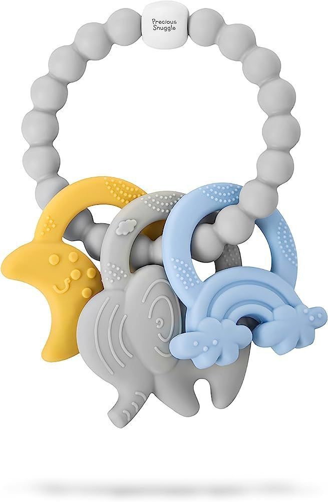 an elephant, giraffe, and fish teethpick on a white background