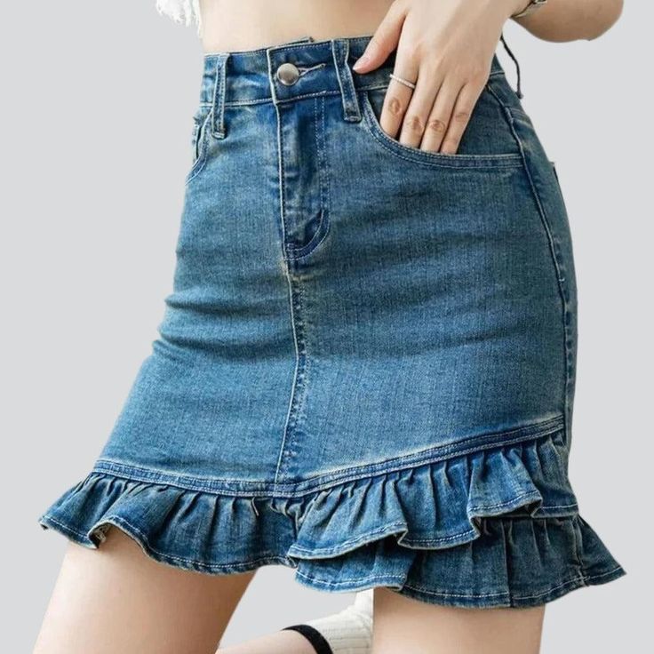 Welcome to the 2023 Summer Collection. where couture meets nostalgia! Our Ruffle Hem Micro Denim Skirt is the perfect blend of contemporary chic and vintage '90s underground. From its distressed detailing to its mid-waist fit and zipper & button closure. this piece is sure to be your summer staple.Key Highlights: Vintage Grunge: Inspired by the iconic '90s alternative movement. this skirt exudes an effortlessly cool attitude. Distinctive Distressed Pattern: Expertly crafted wear and tear. captur Trendy Ruffled Denim Skirt For Spring, Trendy Spring Ruffled Denim Skirt, Spring Trendy Ruffled Denim Skirt, Spring Mid-rise Denim Mini Skirt, Fitted Denim Blue Skirt With Frayed Hem, Fitted Denim Skirt With Ruffles, Denim Ruffled Mini Skirt, Denim Mini Skirt With Ruffles, Fitted High Waist Denim Skirt With Frayed Hem