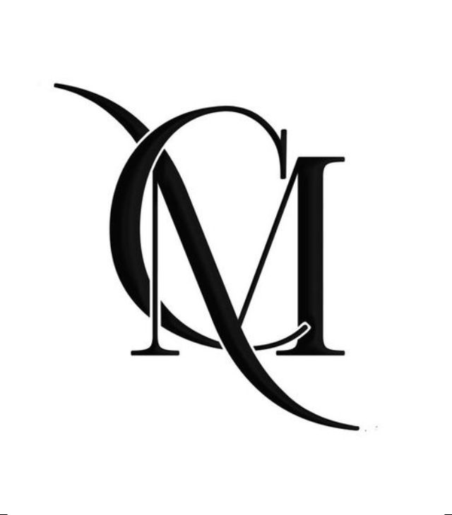 the letter m is made up of two letters and has an elegant design on it