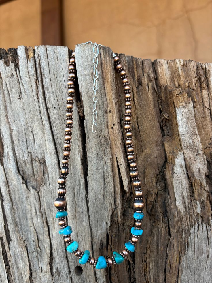 Handcrafted by Navajo artist Lucinda Sardo, this Copper Turquoise Choker is a stunning piece of jewelry. The unique combination of turquoise and copper makes it a one-of-a-kind accessory, while the 12" length and 3" extender provide versatility and comfort. Elevate your style with this expertly crafted choker. Southwestern Turquoise Necklace With Patina, Southwestern Turquoise Cabochon Necklace, Southwestern Brown Copper Jewelry, Stretch Beaded Bracelets Diy, Southwestern Adjustable Turquoise Necklace Hand-strung, Adjustable Southwestern Hand-strung Turquoise Necklace, Turquoise Choker, Nickel-free Southwestern Blue Turquoise Necklace, Southwestern One-of-a-kind Turquoise Necklace