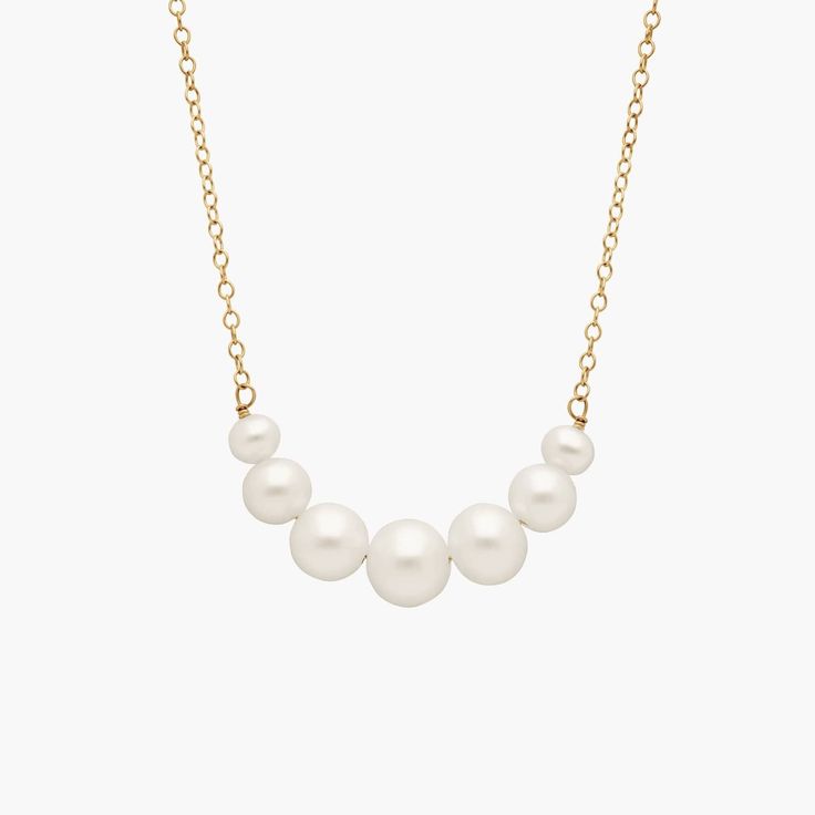 Add some freshness to your pearls with this graduated smile necklace of freshwater cultured pearls. Ranging from 3.5mm pearls to 6.5mm, this is the perfect gift for a bridesmaid or on your wedding day. Refined Anniversary Pearl Necklace With Pearl Chain, Refined Pearl Chain Necklace For Anniversary, Minimalist Single Strand Pearl Necklace For Anniversary, Refined Akoya Pearl Necklace With Pearl Chain, Refined Pearl Necklace For Anniversary, Refined Akoya Pearl Necklace, Refined Pearl Necklace With Pearl Drop, Refined Pearl Necklace With Pearl Chain, Refined Pearl Drop Necklace