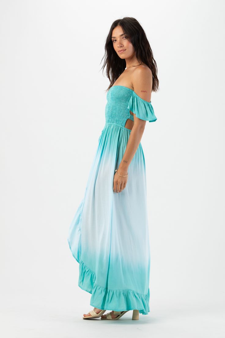 What are dreams made of? Wrapped in lightweight rayon fabric, the Heath Maxi Dress makes paradise a reality. Featuring a smocked strapless top with an eye-catching strappy back and off the shoulder flutter sleeves, the Heath Maxi reveals inner beauty and adds soft comfort for your journey. Details: 100% Rayon Hand wash cold & Lay flat to dry Features: Strapless smocked bodice, Off the shoulder flutter sleeves, Three Back Straps, Ruffled overlap panel skirt. Measures: Smocked bodice measures appr Bohemian Strapless Sundress For Brunch, Bandeau Beach Dress With Ruched Detail, Bandeau Ruched Dress For Beach, Bandeau Ruched Beach Dress, Strapless Smocked Bodice Sundress For Beach, Strapless Sundress With Smocked Bodice For Beach, Off-shoulder Sundress For The Beach, Off-shoulder Sundress For Beach, Bandeau Dress With Smocked Bodice For Vacation