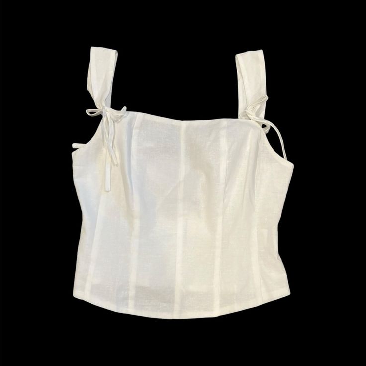 Nwt Rihoas Cotton Linen Blend Sleeveless Crop Top Size Small New With Tags Fabric Tie Adjustable Straps Hidden Zippered Back Pit To Pit: 33” Shoulder To Bottom Hem: 17” Measurements Are Approximate And Taken While Laying Flat Photos Are Part Of The Description From A Pet & Smoke Free Environment Location - C15 Shop With Confidence *Posh Ambassador *Top Rated Seller *Fast Shipping *Packaging With Care * Bundle Other Items To Maximize Your Shopping Dollars Elegant Sleeveless Tops With Straps, Cropped Cotton Tank Top With Tie Straps, Cotton Sleeveless Tank Top With Tie Straps, Sleeveless Strapped Crop Top For Vacation, Sleeveless Cotton Crop Top With Tie Straps, Sleeveless Crop Top With Straps For Vacation, Chic White Tank Top With Straps, Elegant Sleeveless Crop Top For Beach, Strap Sleeveless Crop Top For Day Out