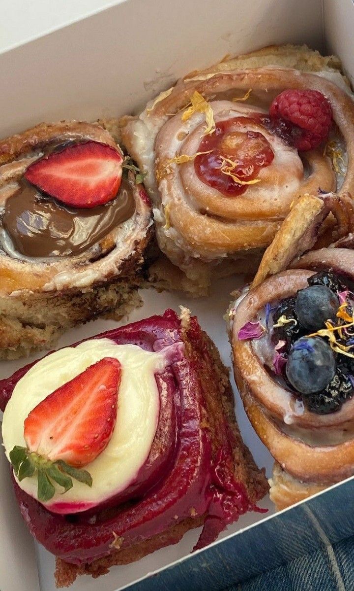 a box filled with different types of pastries