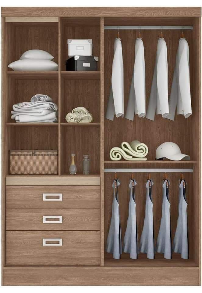 an open wooden closet with clothes and other items