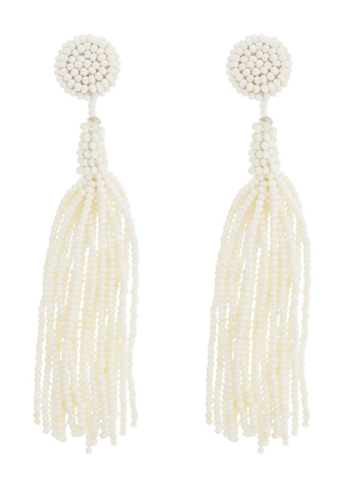 We love these 3” drop glass-bead Finan Earrings for their effortless yet stunning style! Perfectly suited for everyday casual dress paired with your favorite jeans and your go-to cotton top, and equally suited for elegant dress-up dining out with friends at one of your favorite restaurants like AVA Mediterranean or Enzo’s on the Lake. Available in two alluring coastal shades: Midnight Blue and Cream Model is also wearing: Camelia packable hat in white, cotton Paloma top from Coco Indigo's Privat Packable Hat, Stunning Style, Women Artisans, Cotton Top, Elegant Dress, Glass Bead, Paloma, Cotton Tops, Favorite Jeans