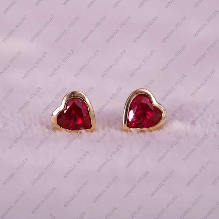 Ruby Heart Tiny Studs Earring, Solitaire Earring, Pink Gemstone Earring, Love Gift, Bezel Set Earring, Anniversary gift For Woman handmade Jewelry, Best Gift For Love  Available Gold Color: Yellow Gold ,Rose Gold, Yellow Gold. ✦ Gemstone: Ruby ✦ Ruby weight: 0.44ct Approx. ✦ Location: Cartilage, Conch, Daith, Earlobe, Tragus ✦ Color: Pink ✦ Shape: Heart ✦ Earring height: 5 mm ✦ SKU: 2937 Metal Type: 925 Sterling Silver Solid 9k,14K, 18k Gold ▷ Returns & Exchanges I understand how important it is to love what you buy! If, for any reason, you are not satisfied with your purchase, I gladly accept returns, exchanges, and cancellations. * Please contact me within 2 weeks of delivery. * Ship item(s) back to me within 3 weeks of delivery. * Request a cancellation: within 24 hours of purchase. No Pink Ruby Earrings, Heart-shaped Birthstone Earrings For Wedding, Heart Shaped Birthstone Earrings For Wedding, Valentine's Day Heart Gemstone Earrings, Hypoallergenic Heart Cut Jewelry For Valentine's Day, Mother's Day Heart Shaped Birthstone Earrings, Mother's Day Heart-shaped Birthstone Earrings, Valentine's Day Hypoallergenic Heart Cut Jewelry, Valentine's Day Anniversary Birthstone Earrings