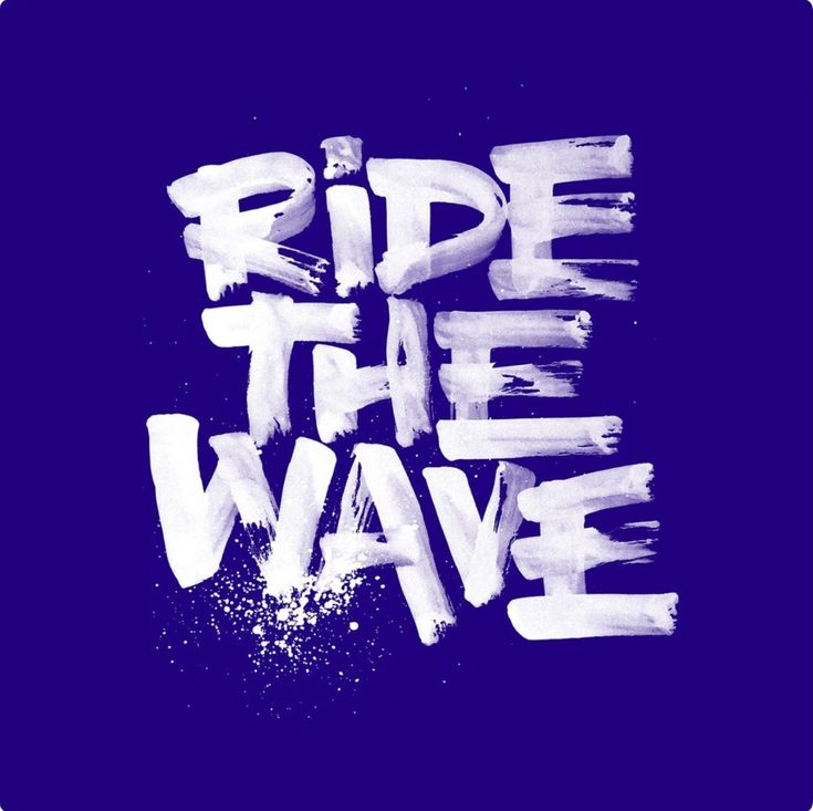 the words ride the wave written in white paint on a blue background with splatters