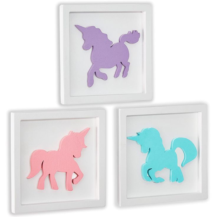 three framed cut outs of horses in different colors and shapes, one pink, one blue