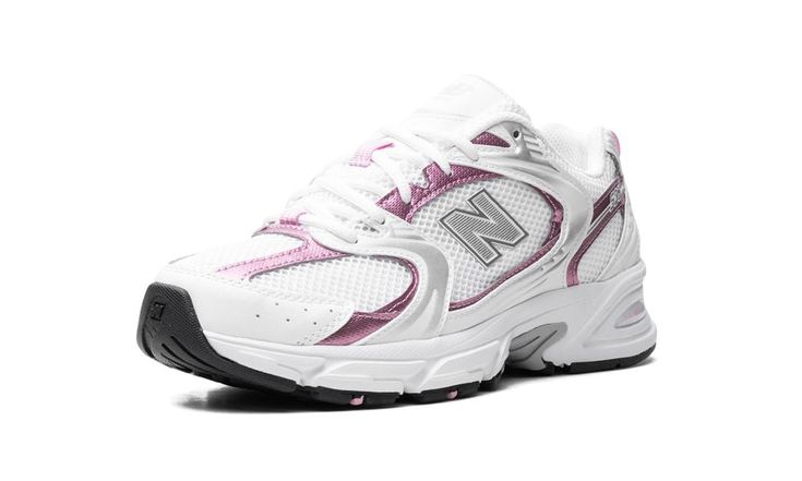 The New Balance 530 “Pink Sugar” is a colorway of the retro running sneaker with eye-grabbing pink accents.  The “Pink Sugar” features a white open-mesh construction contrasted with Pink Sugar synthetic leather overlays in a metallic finish, and white and Metallic Silver overlays.  A grey “N” logo appears on the mid-panel, while an “NB” logo is seen on the tongue.  Underfoot, a chunky white foam midsole completes the look.  The New Balance 530 was originally released in 1992 before returning to the scene as a lifestyle shoe in the modern day.  Release date: March 29, 2024 New Balance 530 Pink, New Balance 530 White, Black Jeans Outfit, Pink Sugar, Stadium Goods, Metallic Pink, Pink Accents, New Balance Shoes, Pink Outfits