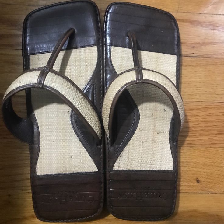 Brand New Never Worn Leather Flip Flops With Round Toe For Vacation, Casual Leather Flip Flops With Woven Sole, Leather Flip Flops For Vacation, Leather Flat Flip Flops For Beach Season, Leather Slip-on Sandals For Summer Outings, Leather Open Toe Flip Flops For Summer, Brown Round Toe Flip Flops For Outings, Leather Open Toe Flip Flops For Summer Outings, Leather Flip Flops For Summer Outings