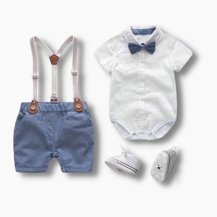 Dress your little boy in style and comfort with our Baby Boy Tie and Suspenders set! This adorable outfit is the perfect choice for your little ones, combining fashion and convenience for a charming look. The set features a short-sleeve shirt with a classic bowtie and matching suspenders shorts, creating a cool and fashionable ensemble. The turn-down collar design adds a touch of sophistication, making your baby boy look dapper and stylish. Crafted with care, the shirt comes with 3 snaps at the Light Blue Cotton Sets For Summer, Light Blue Short Sleeve Sets For Summer, Light Blue Short Sleeve Summer Sets, Light Blue Short Sleeve Sets For Spring, Light Blue Short Sleeve Spring Sets, Fitted Short Sleeve Sets For Playtime, Classic Short Sleeve Sets For Spring, Classic Cotton Set For Spring, Classic Blue Short Sleeve Set