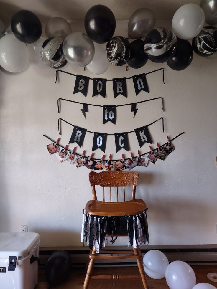 DIY-Dollar Tree balloon arch string, black ribbon, Cricut cut black banner with silver vinyl, 0-12 mo 4x4 photo string, ONE music note cut fabric high chair banner/decoration. Rock And Roll Bday Party Ideas, Rock One Birthday, Born Two Rock Birthday Boy, Another One Bites The Dust 1st Birthday, Born 2 Rock Birthday Party, Rock And Roll First Birthday Party, Born To Rock Birthday Party, Born Two Rock Birthday, One Rocks Birthday