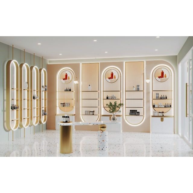 a room filled with lots of white counter top space next to tall wall mounted shelves