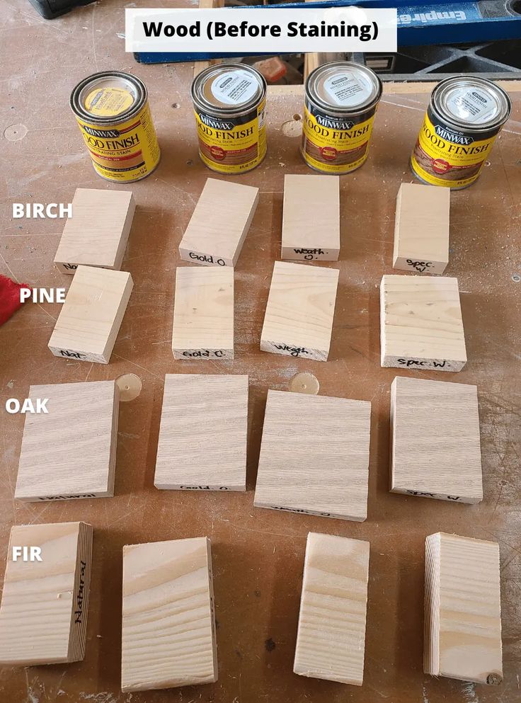 wood staining is being used to make wooden planks for the diy project