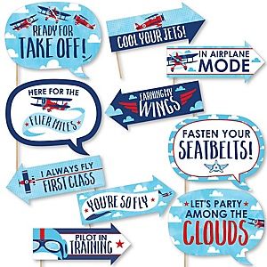 blue and red airplane party photo booth props with speech bubbles, clouds, and airplanes