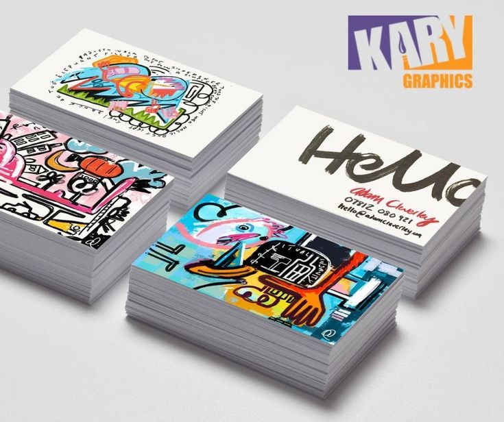 three business cards with different designs on them and the words kary graphics printed on them