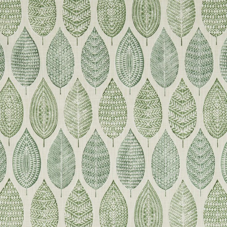 a green and white wallpaper with leaf designs on the back ground, all in different sizes