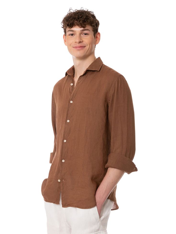 Man Pamplona shirtBrown solid colorComfortable sizeLong sleevesClassic necklineFront closureButtoned cuffsComposition: 100% Linen Brown Spread Collar Top With Button Closure, Classic Brown Tops With Button Cuffs, Brown Relaxed Fit Shirt For Work, Classic Brown Blouse With Button Cuffs, Formal Brown Button-up Shirt, Long Sleeve Shirt With Concealed Placket For Summer, Brown Collared Top With Placket, Brown Formal Top With Button Cuffs, Semi-formal Collared Shirt With Cuffed Sleeves