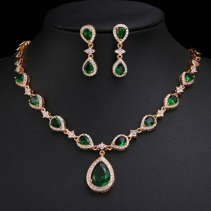 Our Emerald Green Jewelry Set makes a stunning impression. This jewelry set features an emerald green briolette necklace and dangling earrings. The gorgeous emerald green color is sure to make an amazing addition to this jewelry set. Perfect as a gift for yourself or someone you love. Premium Materials - Made from auth Emerald Green Jewelry, Emerald Green Necklace, Bride Jewelry Set, Wedding Necklace Set, Wedding Bride Jewelry, Crystal Jewelry Sets, Emerald Wedding, Luxury Earrings, Earrings And Necklace