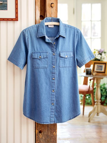 The Short-Sleeve Cotton Denim Shirt: A Comfortable Classic Every Wardrobe Needs Summer Chambray Collared Denim Top, Collared Denim Shirt For Summer, Summer Collared Denim Shirt, Summer Denim Collared Shirt, Collared Cotton Camp Shirt, Cotton Collared Camp Shirt, Summer Short Sleeve Denim Top, Medium Wash Short Sleeve Denim Top For Spring, Light Wash Short Sleeve Denim Top For Summer