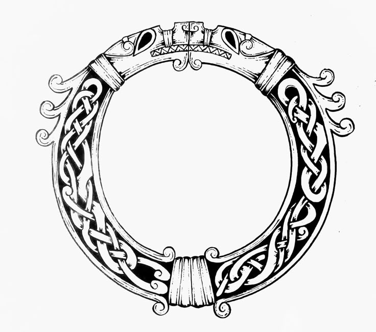 a black and white drawing of a circle with an ornament in the middle