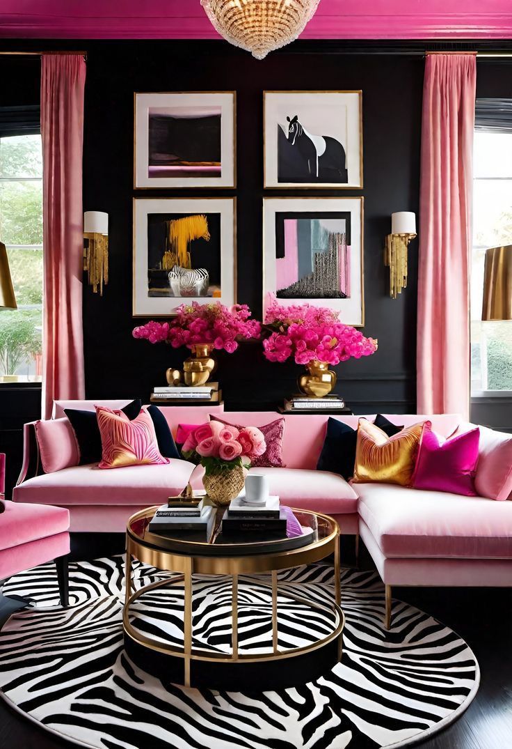 a living room filled with pink and black furniture