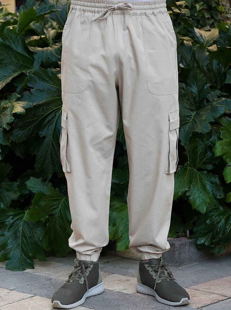 Drawstring elasticized waist Front, back and leg patch pockets Elasticized ankles Item Code: mT4801 Model is 168cm (5 feet 6 inches) and wearing size M Desert Sand, Extra Fabric, Urban Style, Cargo Trousers, Comfortable Dress, Male Body, Trouser Pants, Body Size, Different Fabrics