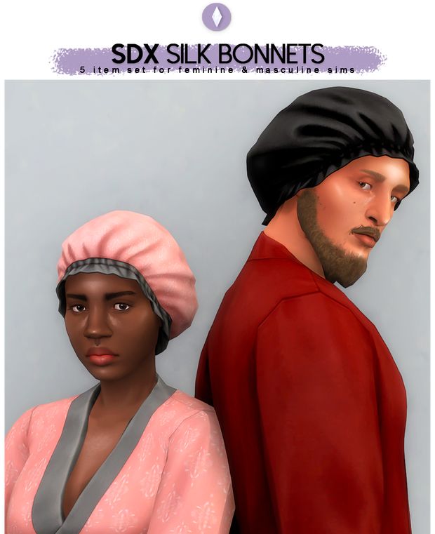 a man and woman wearing head coverings next to each other