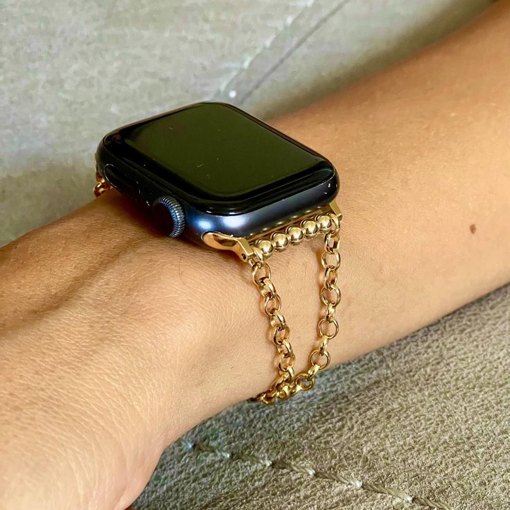 14K Gold Filled Rope Chain Apple Watch Band P R O D U C T ∙ D E S C R I P T I O N ∙ 14K Gold Filled Luxury Chain Bracelet For Apple Watch ∙ ∙ Adjustable Size Bracelet Perfectly Tailored for Your Wrist ∙ ∙ Designed And Handmade by Simeon D Jewelry Studio ∙ ∙ This Bracelet Fits ALL Apple Watch Series ∙ ∙ Please Measure Your Wrist Before Submitting Your Order ∙ ∙ Not For Other Models. Apple Watch Is NOT Included ∙ M O R E ∙ F R O M ∙ U S https://www.etsy.com/shop/SimeonDJewelry ∙ S O C I A L ∙ M E Yellow Gold Rectangular Watch Bands For Gift, Yellow Gold Rectangular Watch Bands As Gift, Rectangular Yellow Gold Watch Bands For Gift, Rectangular Yellow Gold Watch Bands As Gift, Adjustable Gold Metal Apple Watch Band, Adjustable Metal Gold Apple Watch Band, Luxury Gold Chain Link Watch Bands, Gold Metal Apple Watch Band With Extender, Gold Watch Bands With Bracelet Strap For Gift