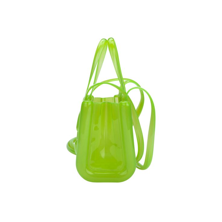 Melissa's collection with Telfar is already a classic in the fashion universe. The Melissa X Telfar Jelly Shopper bags, in Melflex, worn by celebrities such as Emily Ratajkowski, now have new vibrant, translucent and colorful colors, bringing even more Melissa DNA to the collection.  Melflex bag Melflex straps, attached to the bag. Shoulder strap: approx: 530mm Dimensions: 70x140x180mm Translucent and vibrant color palette. The Melflex bag features straps that are securely attached to the body of the bag. It includes a shoulder strap measuring approximately 530mm in length. The overall dimensions of the bag are 70x140x180mm, offering a translucent and vibrant selection of colours. Classic Green Satchel For Shopping, Modern Green Bags With Detachable Handle, Classic Green Satchel For On-the-go, Classic Green Bag For Daily Use, Modern Green Shoulder Bag With Adjustable Handle, Classic Green Bag With Detachable Handle, Luxury Green Shoulder Bag With Adjustable Handle, Luxury Green Bag With Adjustable Handle, Luxury Green Satchel With Adjustable Handle