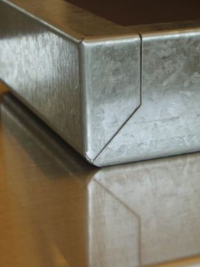 a metal object sitting on top of a table