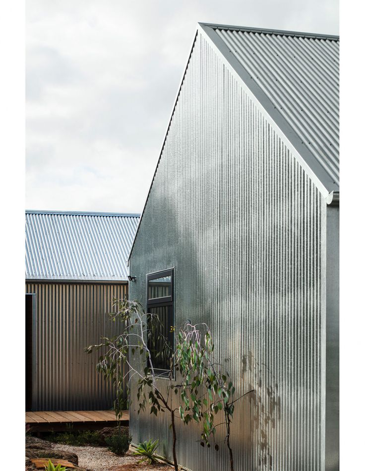 a building that has some plants growing out of it