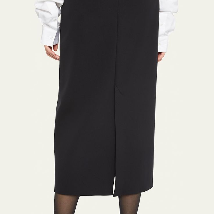 THE ROW "Alumo" skirt in crepe High rise Skirt falls straight from hip to hem Hem falls below the knee Center-back vented hem Hidden closure Nylon/elastane Cotton, lining Made in USA Modern Asymmetrical Pencil Skirt For Workwear, Modern Asymmetrical Pencil Skirt For Work, Modern Lined Maxi Skirt For Work, Workwear Elastane Maxi Skirt, Workwear Skirt With Side Slits, Pleated Elastane Skirt For Workwear, Asymmetrical Lined Skirt For Work, Office Midi Elastane Skirt, Lined Asymmetrical Skirt For Work