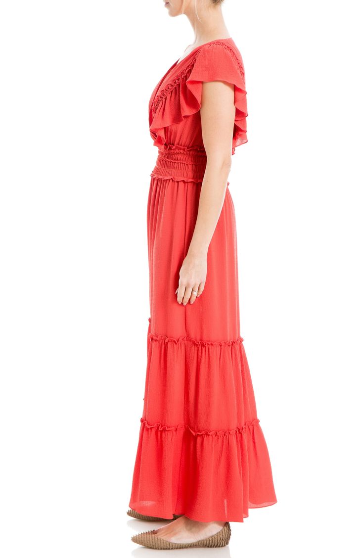 Lightweight fabric is shaped into this flowy crepe maxi dress designed with tiers of ruffles and smocked detailing. Surplice V-neck Short flutter sleeves 97% polyester, 3% spandex Machine wash cold, line dry Imported Model stats: 5'10", 32" bust, 25" waist, 36" hip. Model is wearing size Small. Casual Ruffled Floor-length Maxi Dress, Casual Floor-length Maxi Dress With Ruffles, Casual Floor-length Ruffled Maxi Dress, Tiered Flowy Skirt Maxi Dress, Flowy Rayon Dress With Ruffle Hem, Red Tiered Maxi Dress With Ruffles, Rayon Dress With Ruffle Hem, Solid Tiered Maxi Dress With Ruffle Hem, Red Ruffle Hem Maxi Dress For Vacation