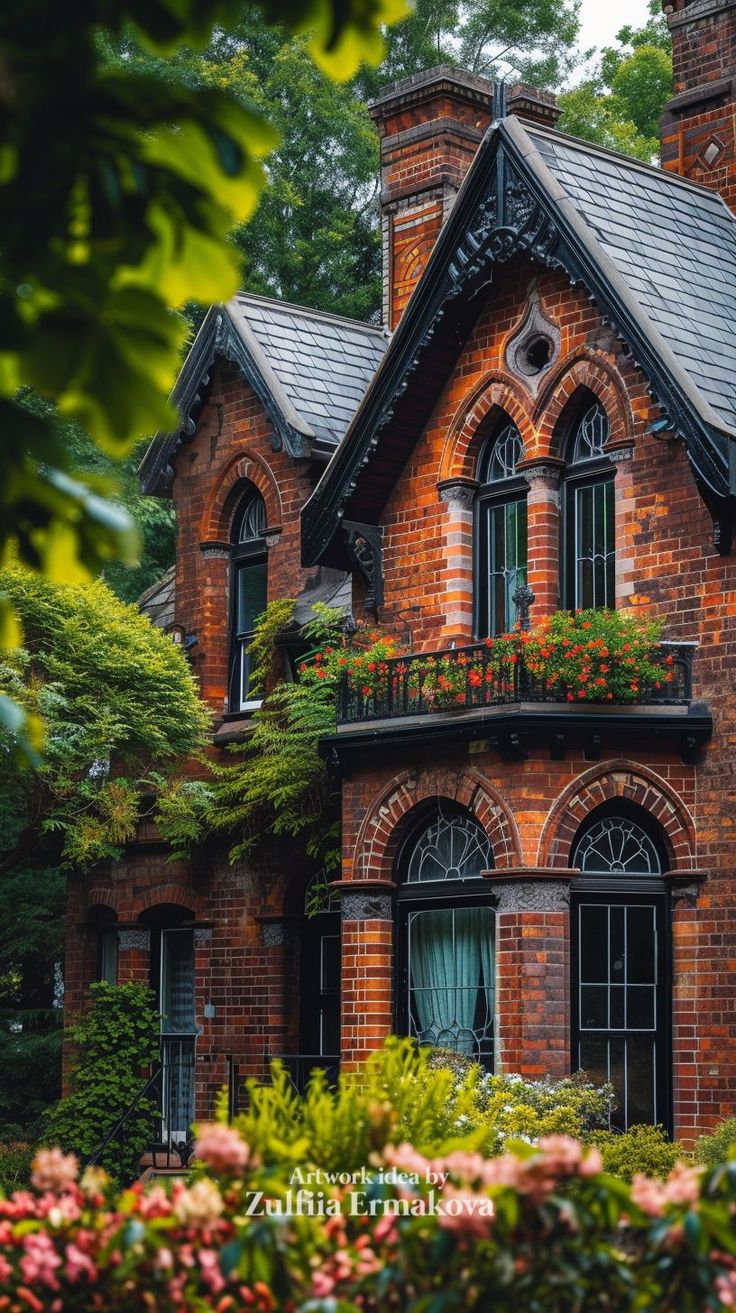 an old brick house with flowers growing on the windows