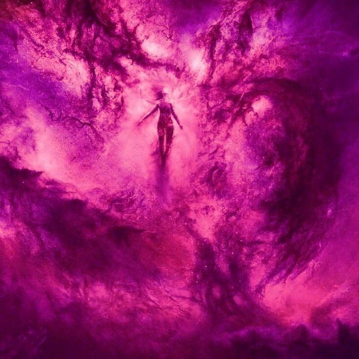 a person standing in the middle of a purple and red space