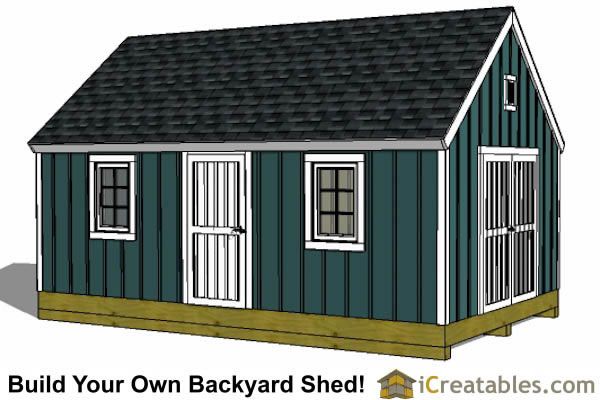 a small shed with the door open and windows on it's side, next to a