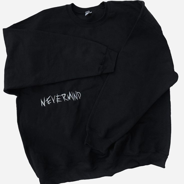 Made on a premium black crewneck, the design is embroidered onto the garment with white thread. Unlike traditional embroidered garments, the 'NEVERMIND' design is stitched around the right rib cage for analogous placement. Please refer to the size guide in the listing for sweatshirt measurements. If you have any questions, please feel free to message me :) If there's a specific size+color you would like, please message me! I'll try my best to accommodate :) Comes with freebies :) Black Sweatshirt With Custom Embroidery For Streetwear, Black Casual Sweatshirt With Embroidered Text, Black Embroidered Text Sweatshirt Affordable, Oversized Black Sweatshirt With Embroidered Logo, Black Sweatshirt With Embroidered Text, Black Crewneck, Embroidered Sweatshirt, Rib Cage, Embroidered Sweatshirts