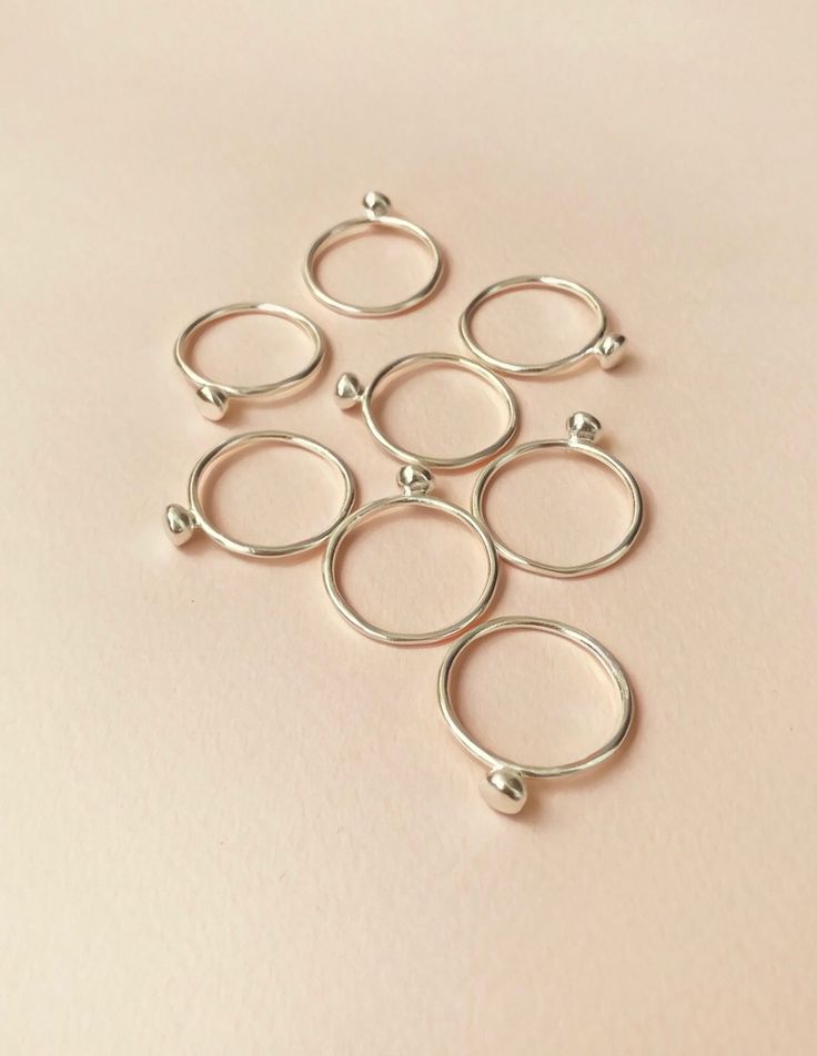 Bell rings, now available in sterling silver | by Studio Baladi Delicate Everyday Metal Ring, Unique Stackable Rings For Everyday, Modern Handmade Stackable Rings For Everyday, Handmade Everyday Rings With Round Band, Simple Handmade Open Ring Jewelry, Minimalist Toe Ring With Ring Detail, Modern Stackable Toe Rings For Gifts, Minimalist Toe Ring With Detail, Handmade Stackable Rings With Round Band As A Gift